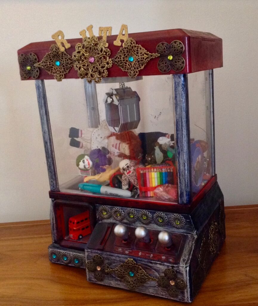 Decorated claw machine