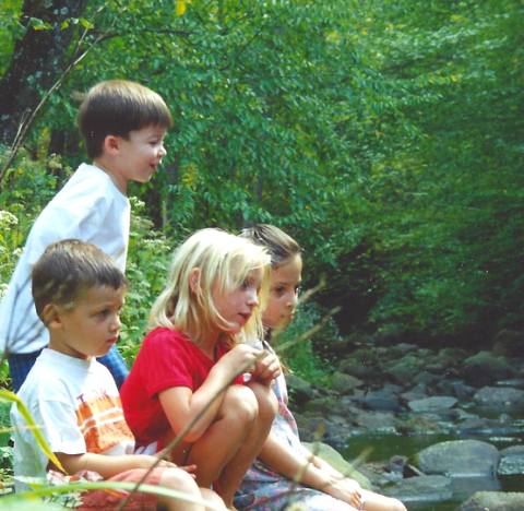 children by the river